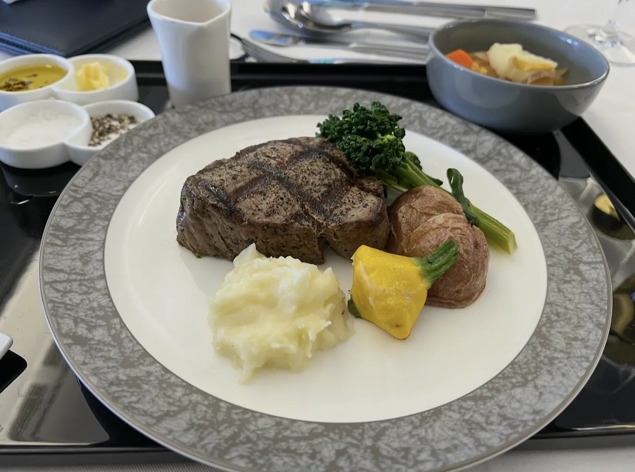 Gourmet steak dinner in business class